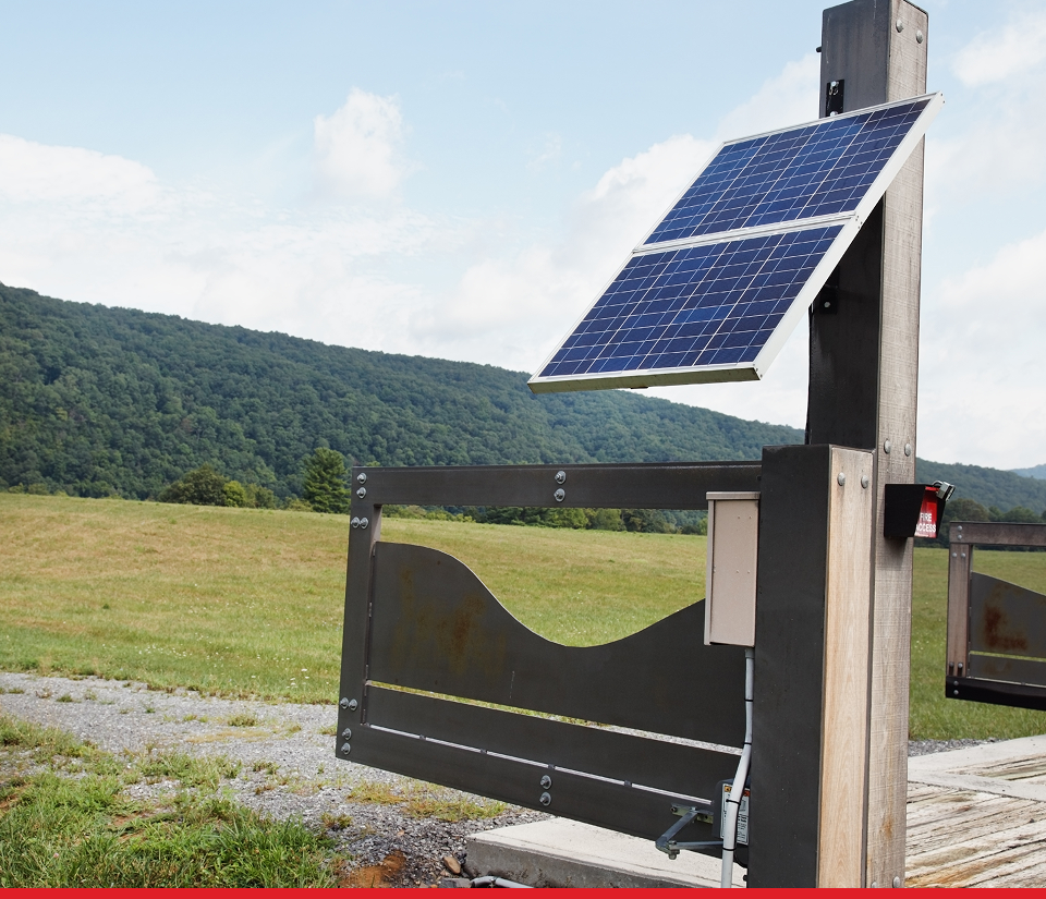 Solar panel on rural gate installation.