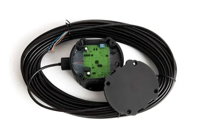 Coiled cable with exposed circuit board.