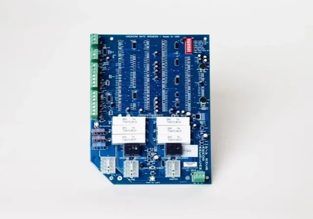 Blue electronic circuit board with various components.